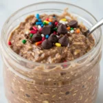 Finished cosmic brownie overnight oats with sprinkles and chips