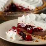 Chocolate Cherry Cream Pie with cherry topping and whipped cream