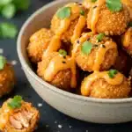 white bowl filled with crispy bang bang salmon bites